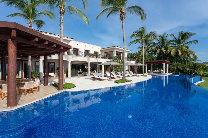 The pool terrace and dining pergola