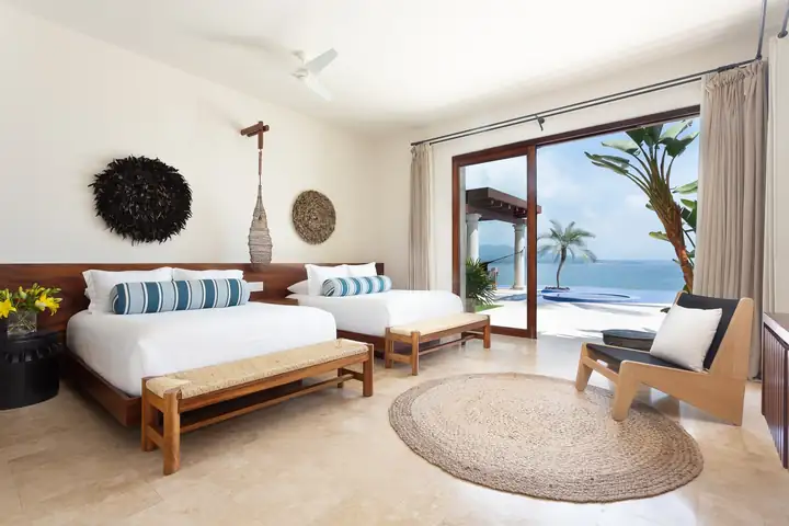 Ocean View Suite 3: two queen beds and the door to the pool terrace